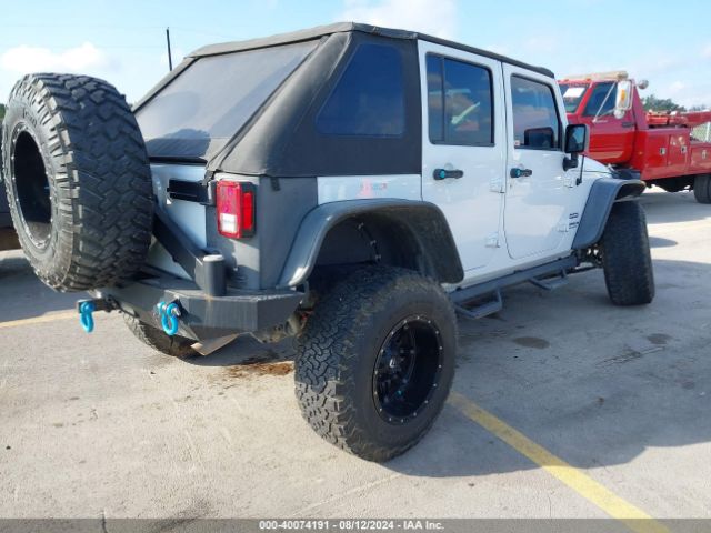 1C4BJWDG5GL107389 Jeep Wrangler Unlimited Sport