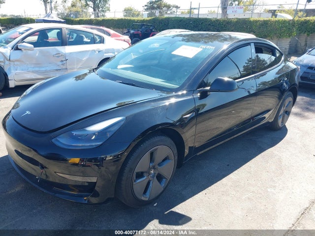 2023 TESLA MODEL 3 5YJ3E1EAXPF574526 Photo 1