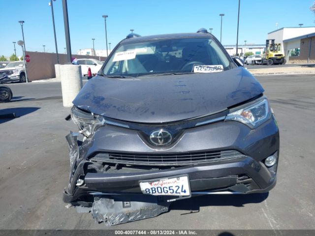 JTMWFREV0JJ731847 Toyota Rav4 Xle