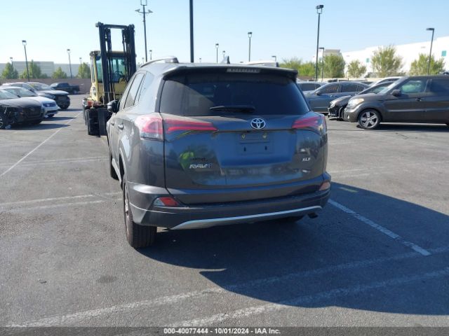 JTMWFREV0JJ731847 Toyota Rav4 Xle