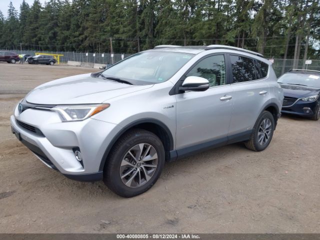 JTMRJREV0GD016425 Toyota Rav4 Hybrid Xle