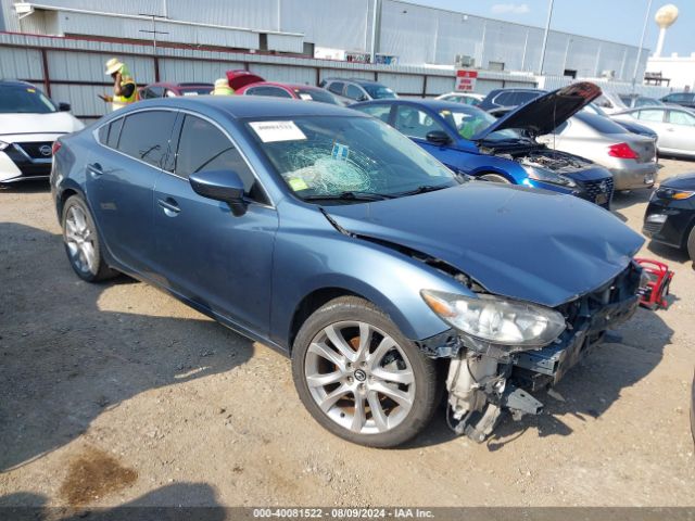 JM1GJ1V69E1130729 auction archive image