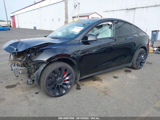2024 TESLA MODEL Y 7SAYGDEF5RF050283 Photo 1