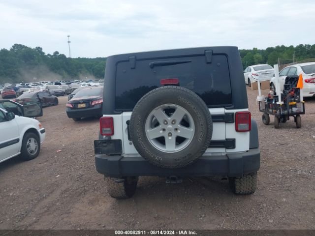 1C4BJWDG8FL520972 Jeep Wrangler Unlimited Sport