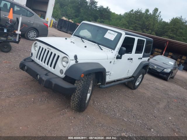 1C4BJWDG8FL520972 Jeep Wrangler Unlimited Sport