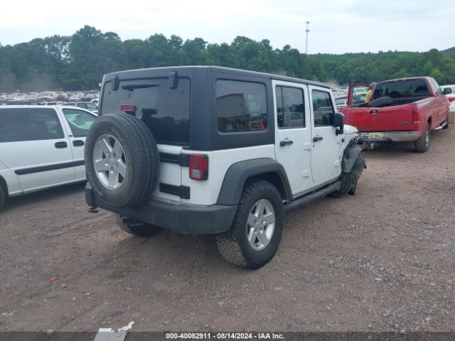 1C4BJWDG8FL520972 Jeep Wrangler Unlimited Sport