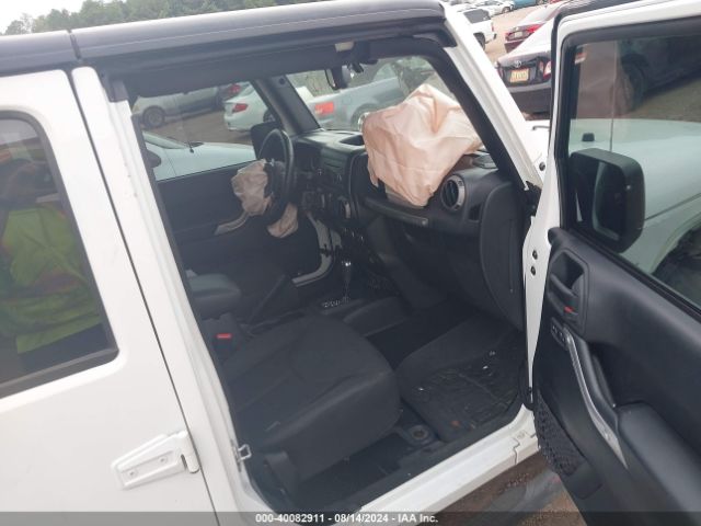 1C4BJWDG8FL520972 Jeep Wrangler Unlimited Sport