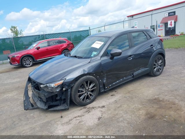 JM1DKDC72H0158492 Mazda Cx-3 Touring