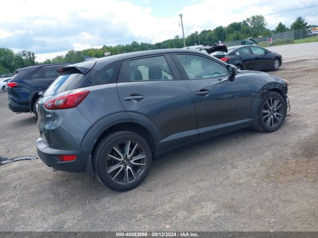 JM1DKDC72H0158492 Mazda Cx-3 Touring