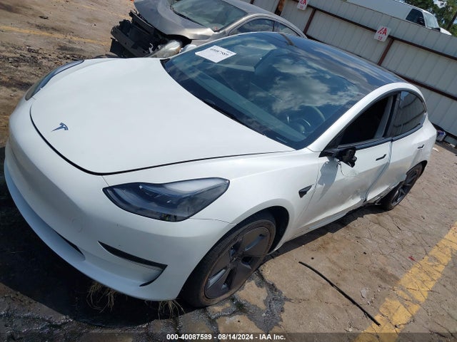 2023 TESLA MODEL 3 5YJ3E1EA8PF671935 Photo 1