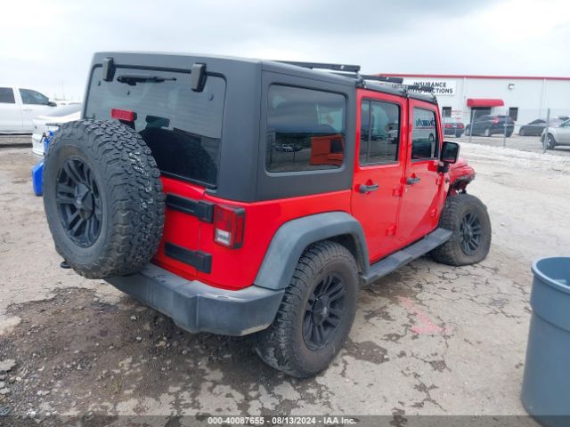 1C4BJWDG5GL332878 Jeep Wrangler Unlimited Sport
