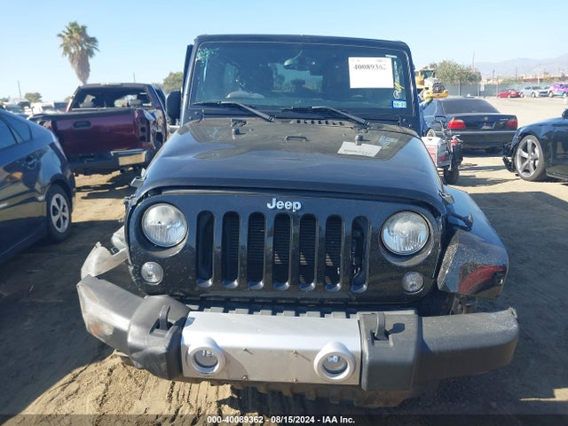 1C4BJWEG0EL271984 Jeep Wrangler Unlimited Sahara