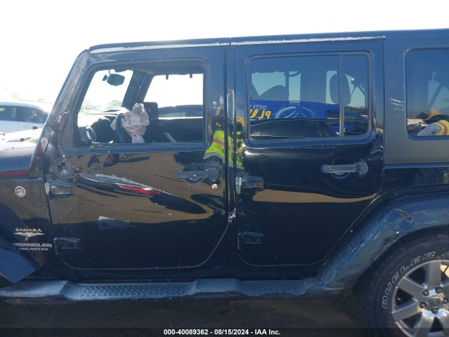 1C4BJWEG0EL271984 Jeep Wrangler Unlimited Sahara