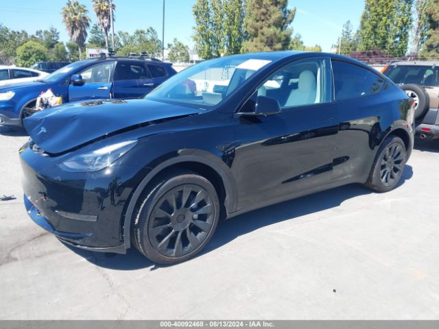 2024 TESLA MODEL Y 7SAYGDED2RF085894 Photo 1