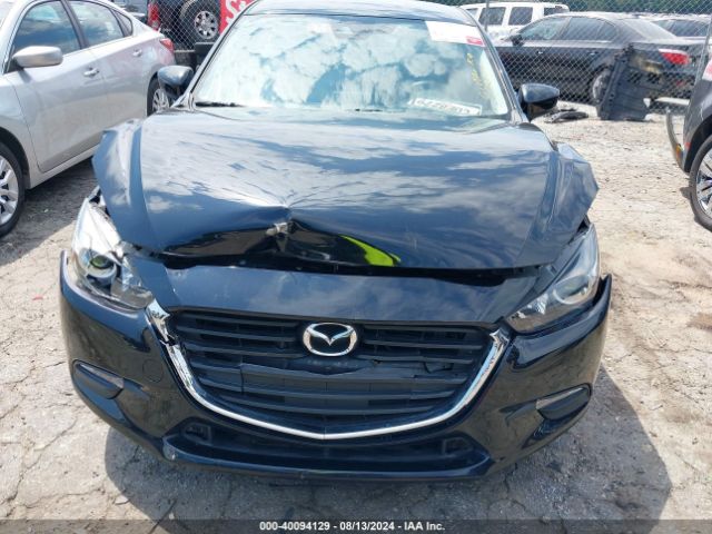 3MZBN1L35JM263568 Mazda Mazda3 Touring
