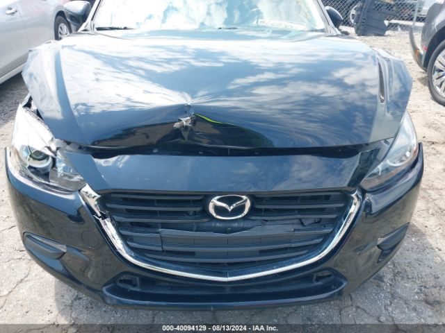 3MZBN1L35JM263568 Mazda Mazda3 Touring