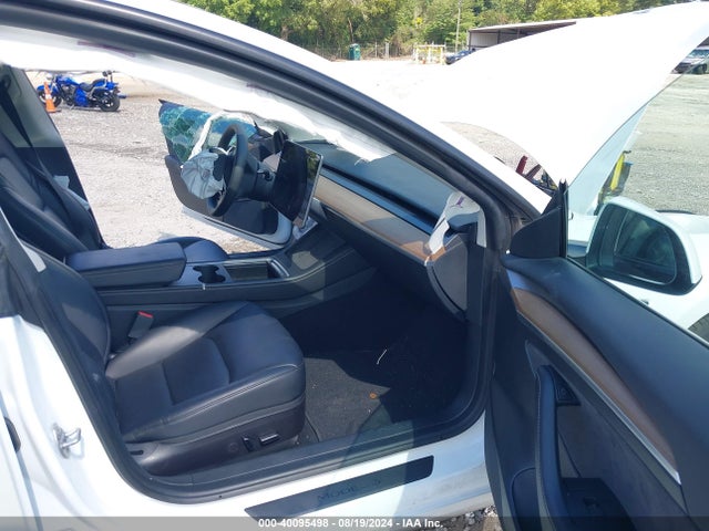2023 TESLA MODEL 3 5YJ3E1EA7PF434854 Photo 4
