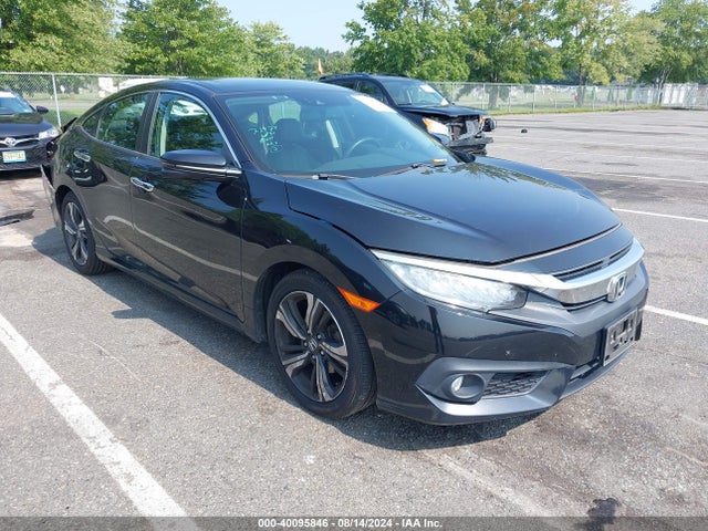 2017 Honda Civic Touring მანქანა იყიდება აუქციონზე, vin: 2HGFC1F94HH638032, აუქციონის ნომერი: 40095846