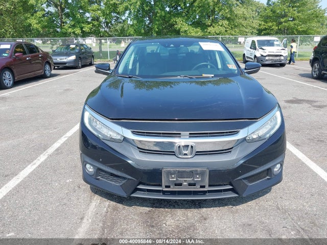 2017 Honda Civic Touring მანქანა იყიდება აუქციონზე, vin: 2HGFC1F94HH638032, აუქციონის ნომერი: 40095846