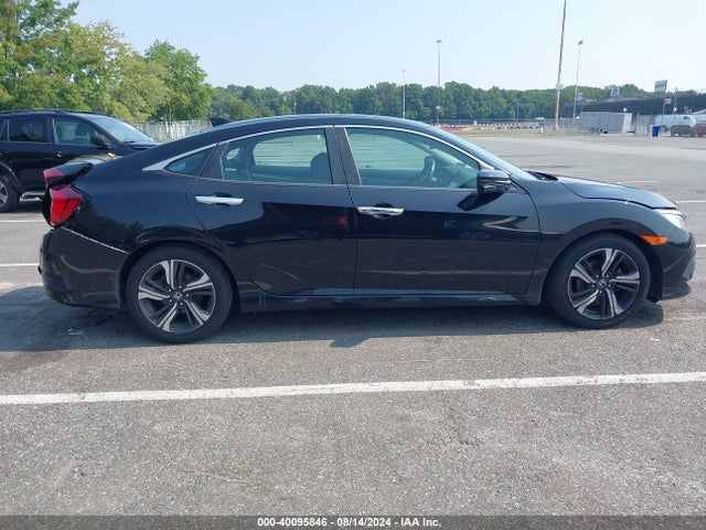 2017 Honda Civic Touring მანქანა იყიდება აუქციონზე, vin: 2HGFC1F94HH638032, აუქციონის ნომერი: 40095846