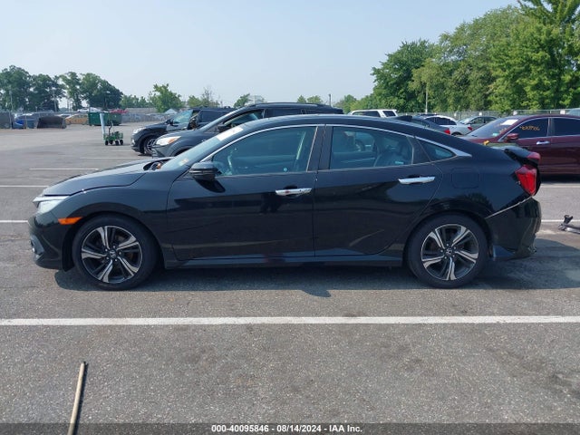 2017 Honda Civic Touring მანქანა იყიდება აუქციონზე, vin: 2HGFC1F94HH638032, აუქციონის ნომერი: 40095846
