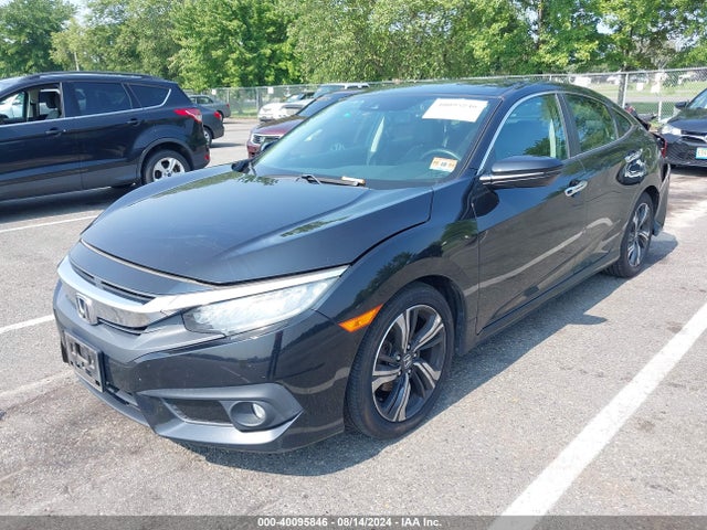 2017 Honda Civic Touring მანქანა იყიდება აუქციონზე, vin: 2HGFC1F94HH638032, აუქციონის ნომერი: 40095846
