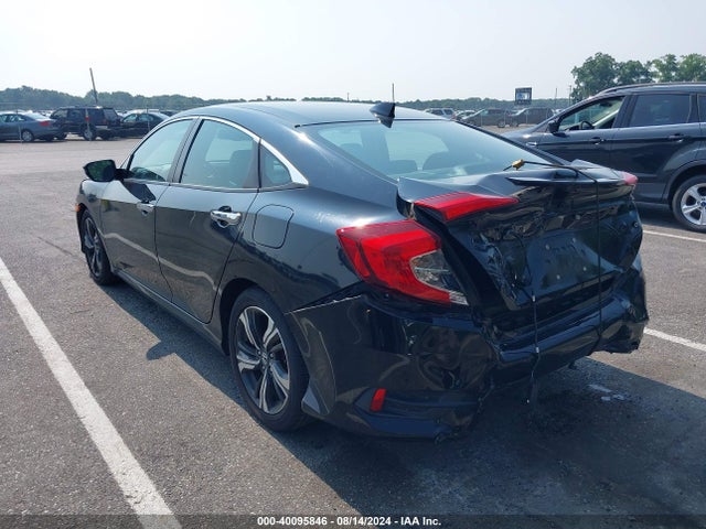 2017 Honda Civic Touring მანქანა იყიდება აუქციონზე, vin: 2HGFC1F94HH638032, აუქციონის ნომერი: 40095846