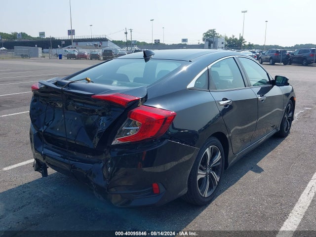 2017 Honda Civic Touring მანქანა იყიდება აუქციონზე, vin: 2HGFC1F94HH638032, აუქციონის ნომერი: 40095846