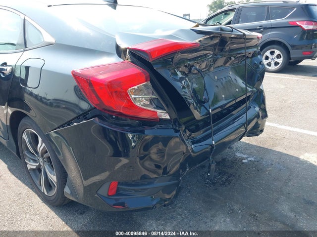 2017 Honda Civic Touring მანქანა იყიდება აუქციონზე, vin: 2HGFC1F94HH638032, აუქციონის ნომერი: 40095846