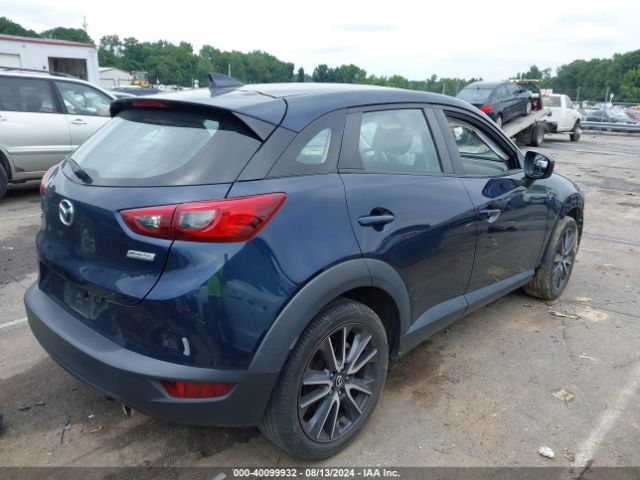 JM1DKDC70J0303325 Mazda Cx-3 Touring