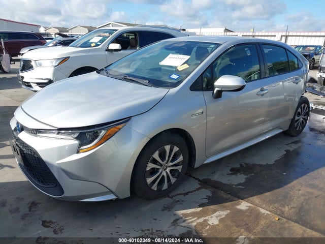 Toyota Corolla Hybrid Le 2021 JTDEAMDE6MJ006465 Image 2