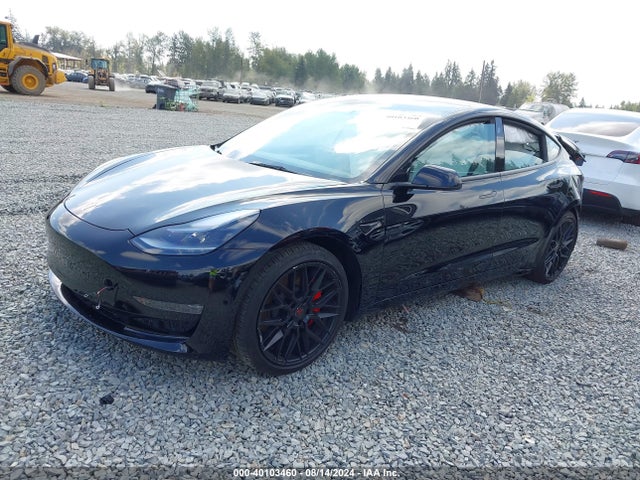 2023 TESLA MODEL 3 5YJ3E1EC8PF667451 Photo 1