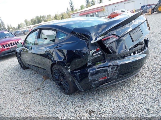 2023 TESLA MODEL 3 5YJ3E1EC8PF667451 Photo 2