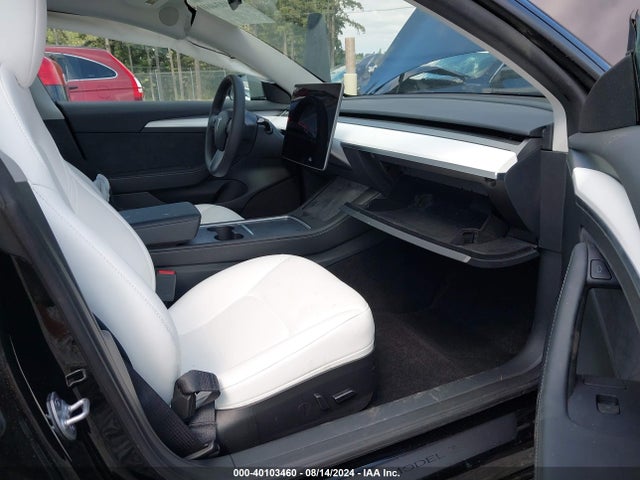 2023 TESLA MODEL 3 5YJ3E1EC8PF667451 Photo 4