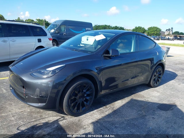 2024 TESLA MODEL Y 7SAYGDED3RF097360 Photo 1