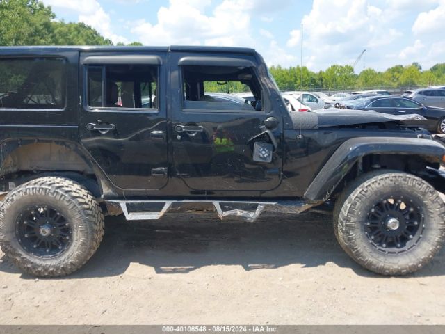 1C4BJWEG0EL135452 Jeep Wrangler Unlimited Sahara