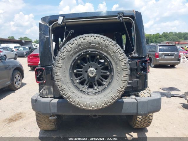 1C4BJWEG0EL135452 Jeep Wrangler Unlimited Sahara