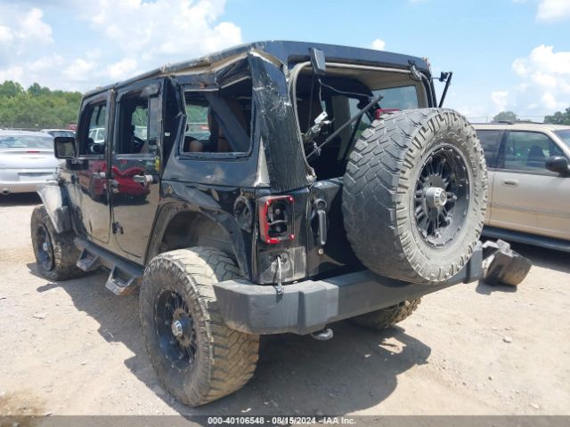 1C4BJWEG0EL135452 Jeep Wrangler Unlimited Sahara
