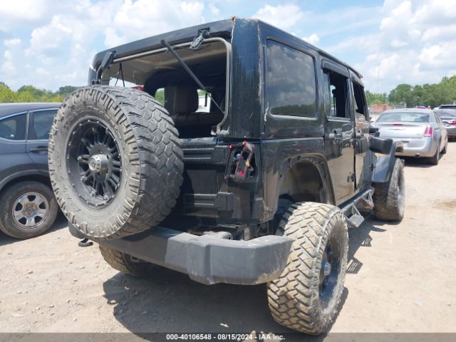 1C4BJWEG0EL135452 Jeep Wrangler Unlimited Sahara