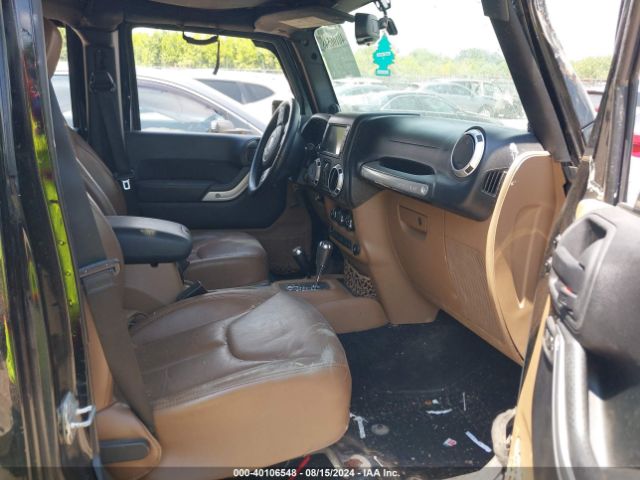 1C4BJWEG0EL135452 Jeep Wrangler Unlimited Sahara