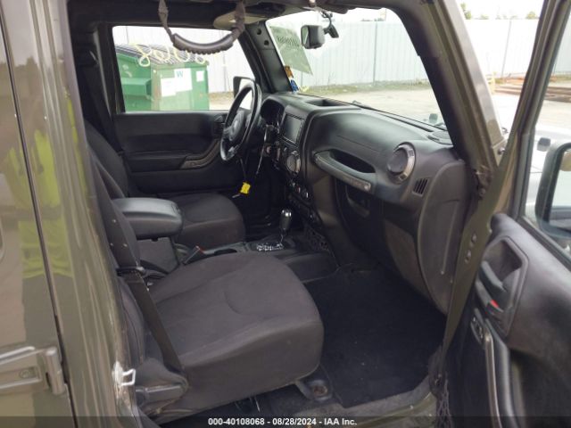 1C4BJWDG9FL602600 Jeep Wrangler Unlimited Sport