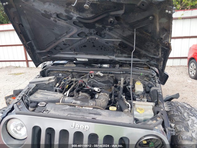 1C4HJWDG6EL202535 Jeep Wrangler Unlimited Freedom Edition