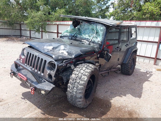 1C4HJWDG6EL202535 Jeep Wrangler Unlimited Freedom Edition