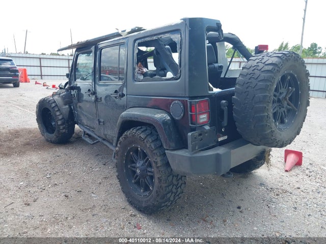 1C4HJWDG6EL202535 Jeep Wrangler Unlimited Freedom Edition