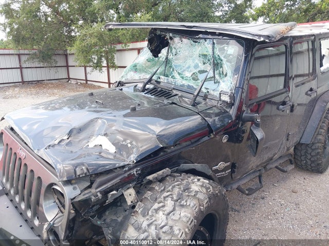 1C4HJWDG6EL202535 Jeep Wrangler Unlimited Freedom Edition