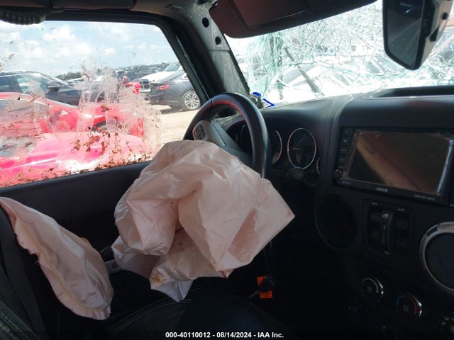 1C4HJWDG6EL202535 Jeep Wrangler Unlimited Freedom Edition
