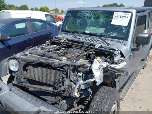 1C4BJWDG3GL270204 Jeep Wrangler Unlimited Sport