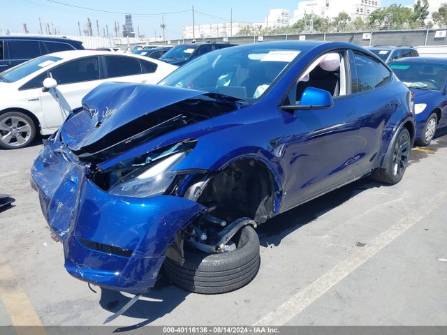 2024 TESLA MODEL Y 7SAYGAEE2RF133093 Photo 1