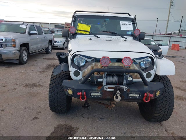 1C4BJWDG9EL161307 Jeep Wrangler Unlimited Freedom Edition