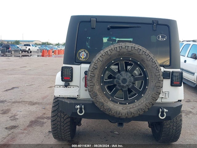 1C4BJWDG9EL161307 Jeep Wrangler Unlimited Freedom Edition
